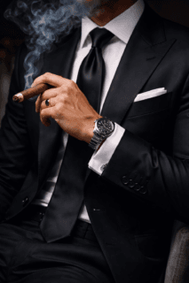 synthetic suit and luxury cigar
